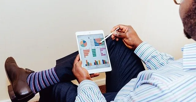 man holding a tablet